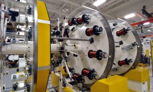 Spool Payout Twister with Capstan and Accumulator Spool Payout Twister with Capstan and Accumulator