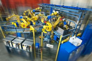 Robotic bin picking automation with conveyors