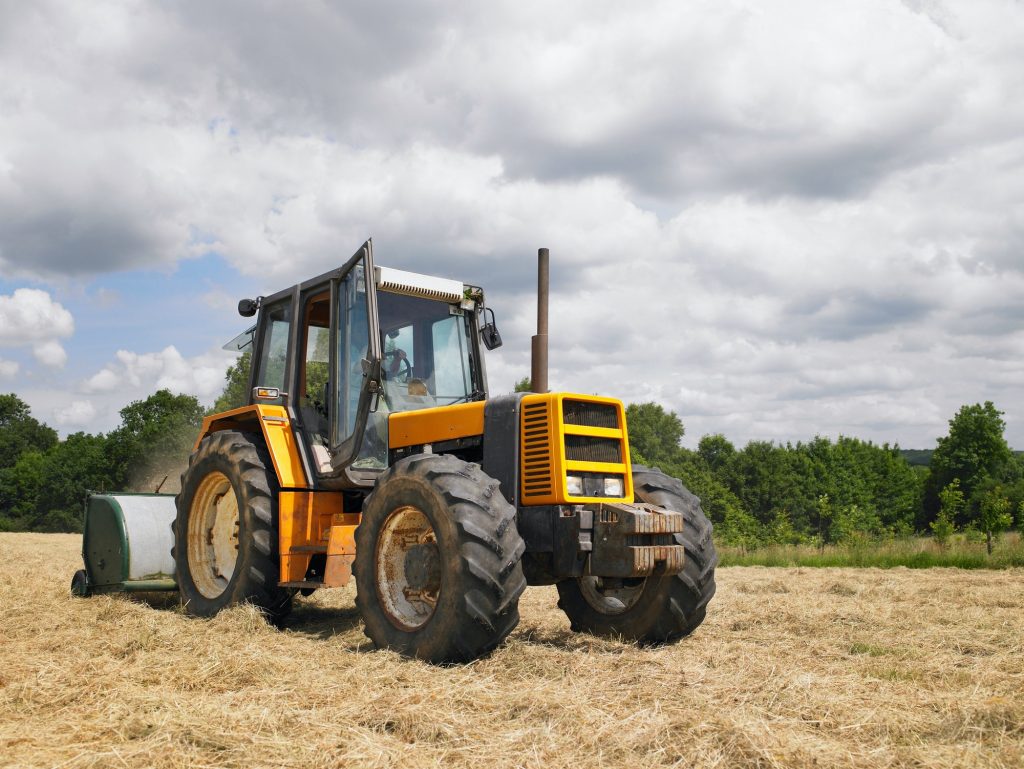man driving tractor